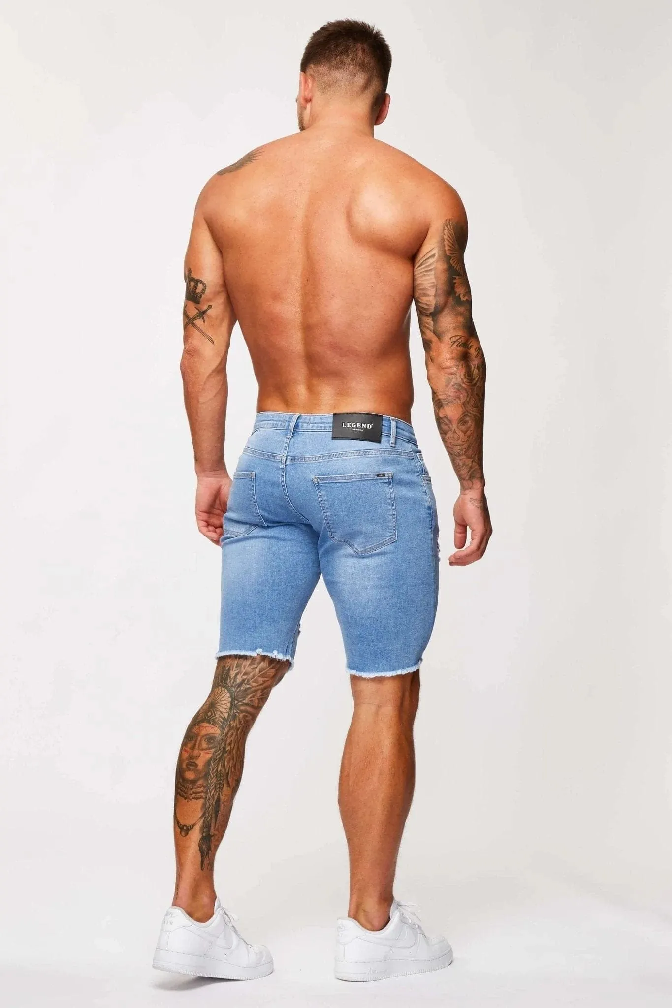 LIGHT BLUE DENIM SHORTS - RIPPED & REPAIRED