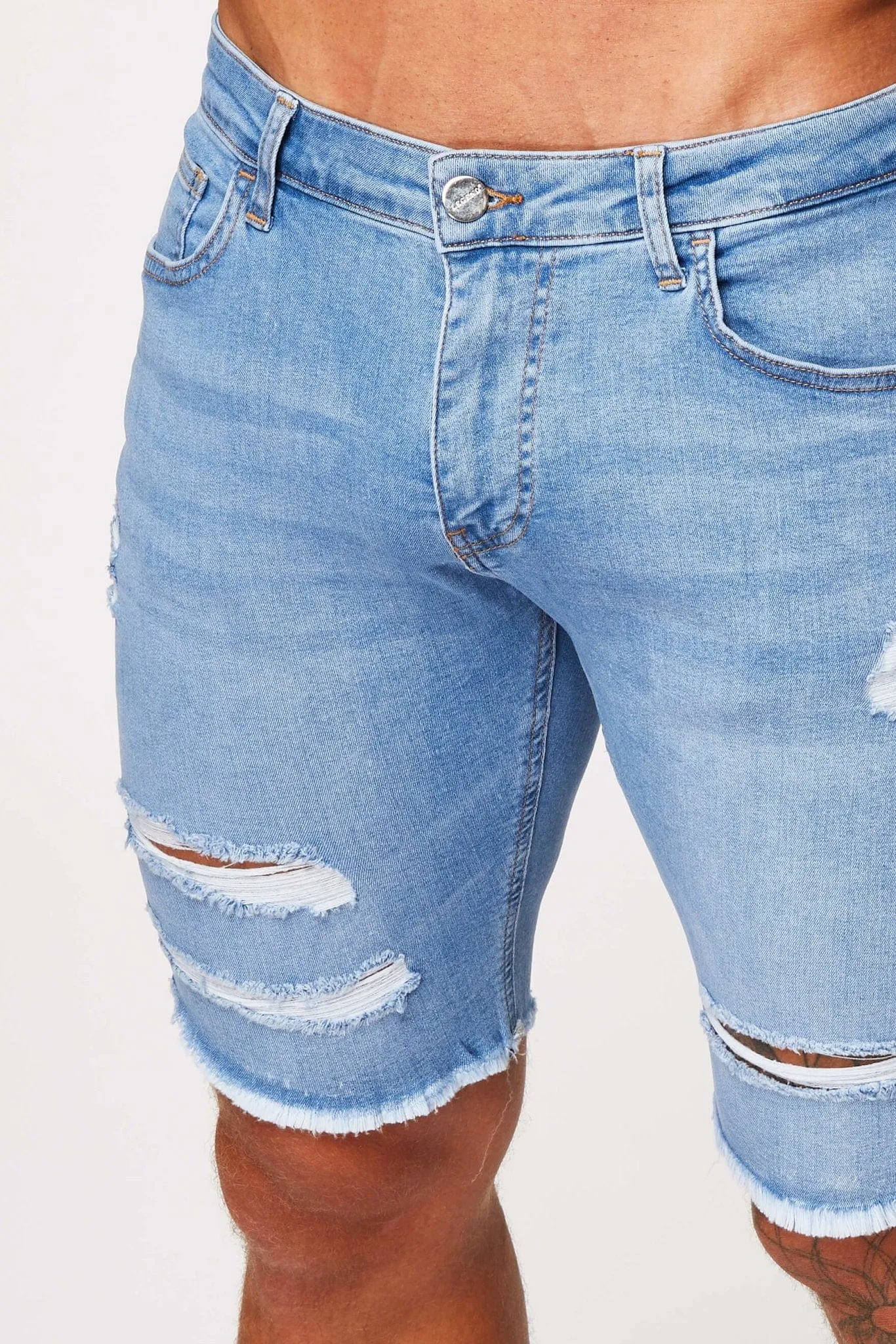 LIGHT BLUE DENIM SHORTS - RIPPED & REPAIRED