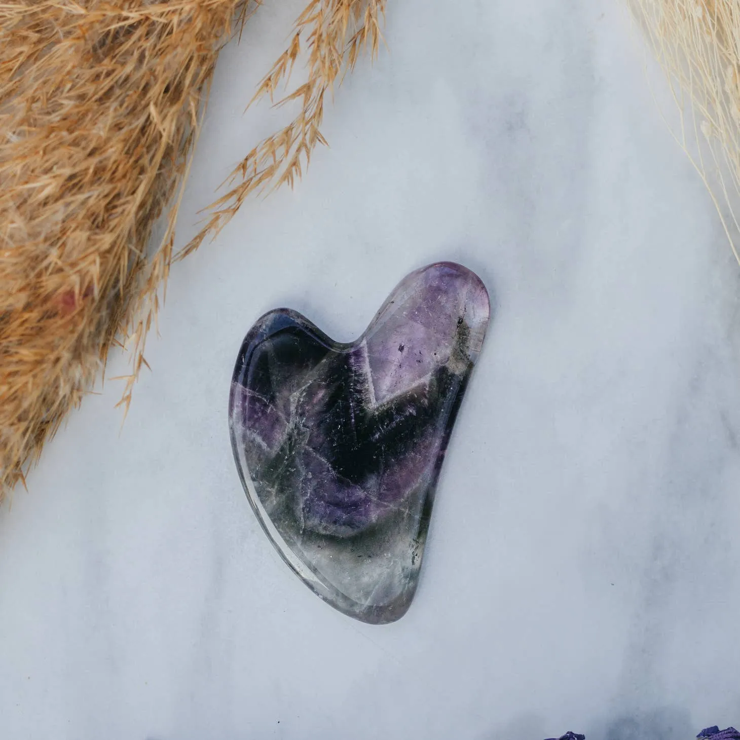 Shadowed Serenity: Amethyst Crystal Gua Sha with Black Skull Pouch